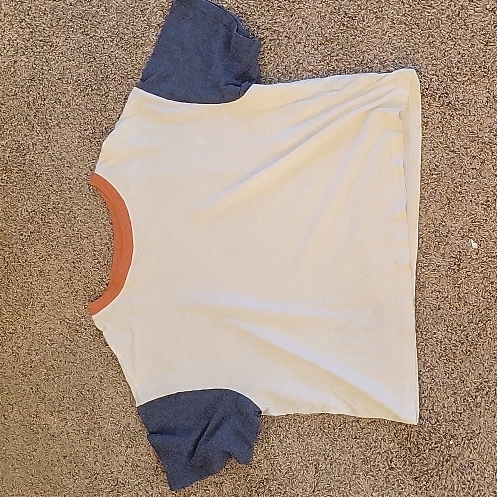 White tshirt with blue sleeves